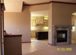 12504_Jacinth_Living_Room_with_see-through_fireplace.jpg
